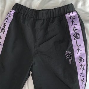 Black with purple rose windbreaker pants